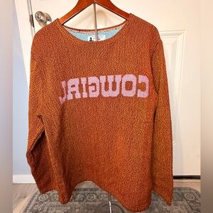Reverse cowgirl orange knit sweater
